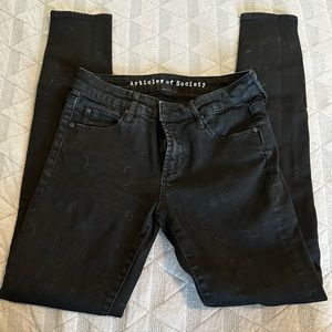 Black articles of society skinny jeans